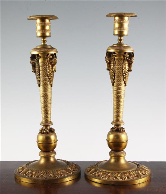 A pair of 19th century French Empire style ormolu candlesticks, 13.75in.